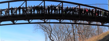 people hiking outside and posing for photo