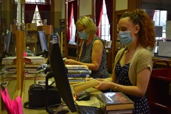 two female librarians at desk (2)