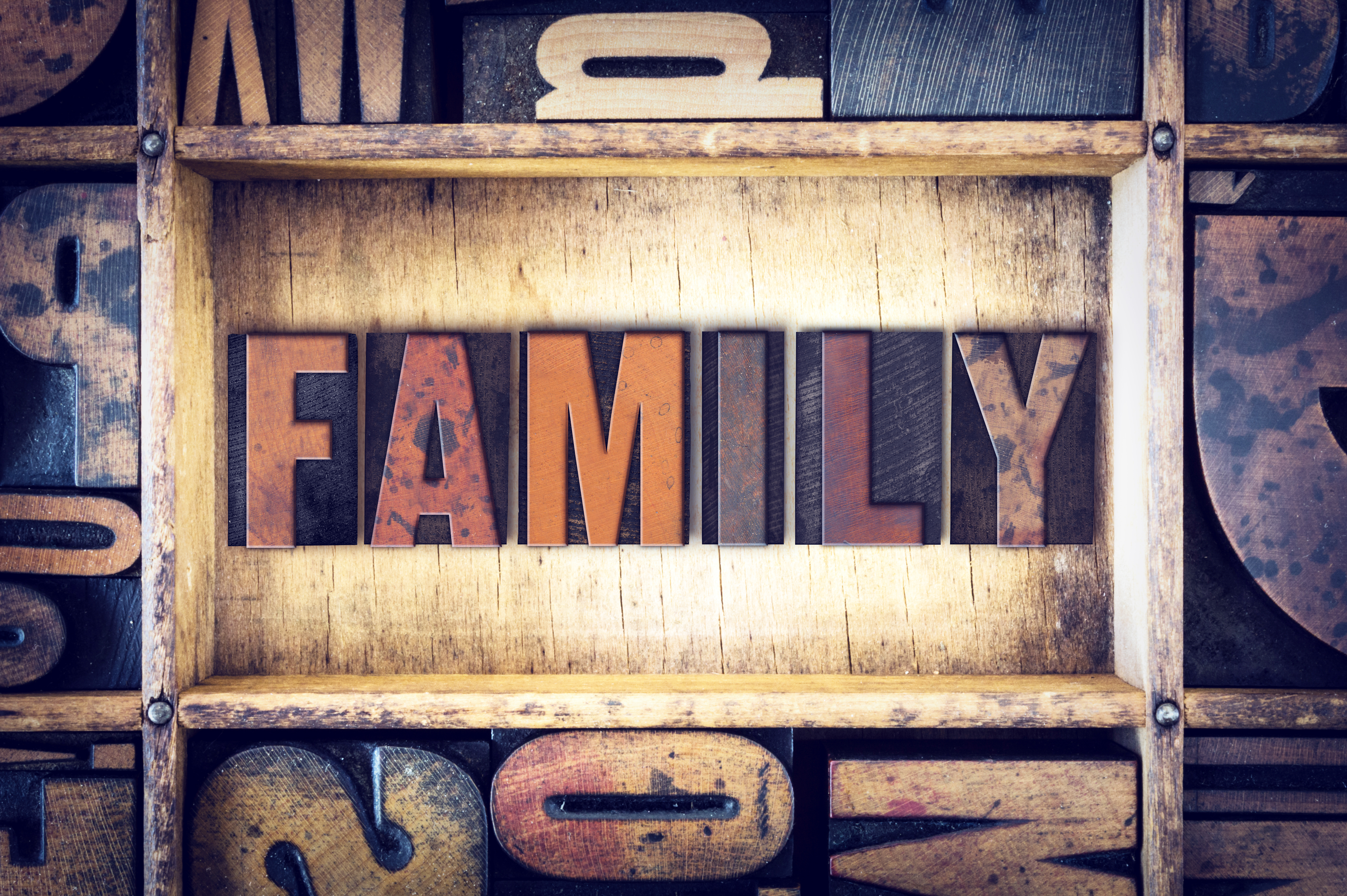 family in block letters