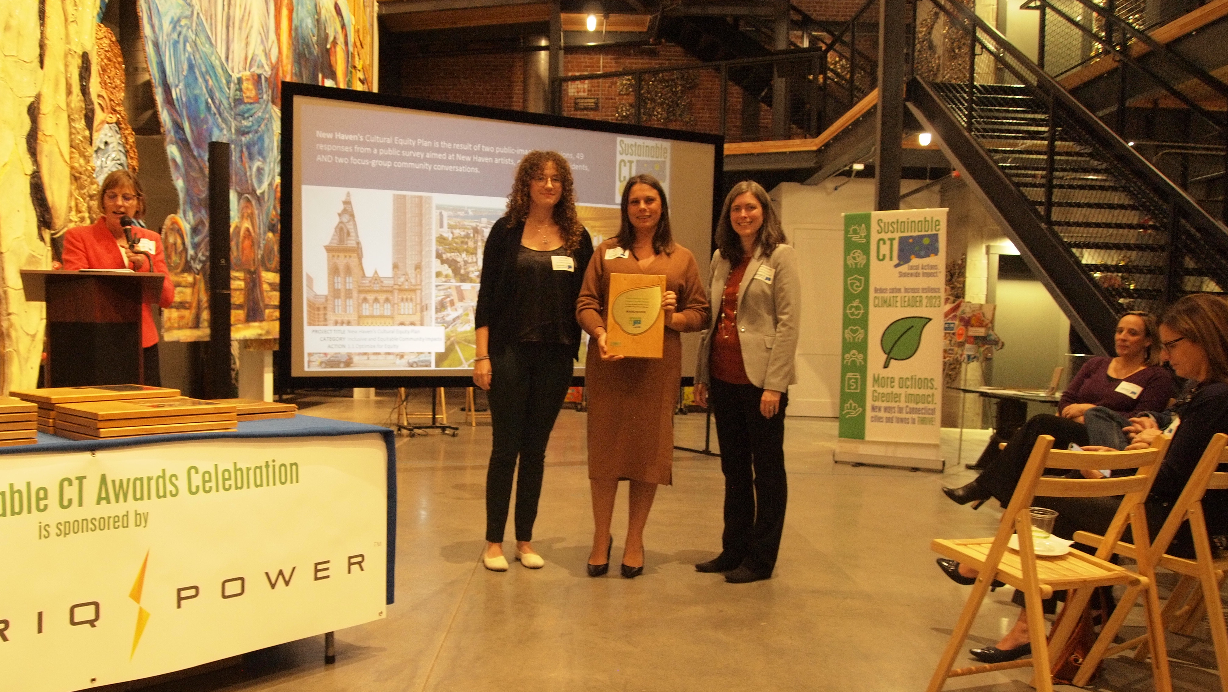 The Town accepting the Climate Leader Designation Award