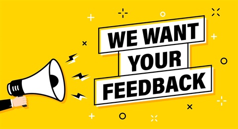 Male hand holding megaphone with We want your feedback speech bubble. Loudspeaker. Banner for business, marketing and advertising.jpeg